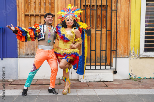 Mexican carnival performers dancing in colorful traditional costumes