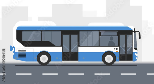 Blue and white city bus traversing an urban road with modern design.