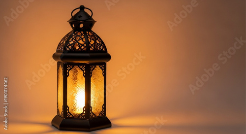 Ornate Islamic Lantern Glowing Warmly.