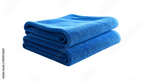 Two folded plush blue textiles on a black background