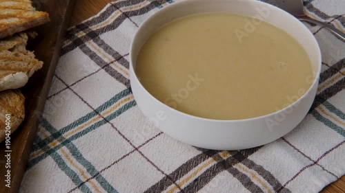 light vegetable vegan vegetarian soup in a bowl, perfect for ramadan iftar