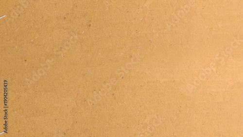 Old brown recycle cardboard kraft paper texture background. Light beige blank paper texture background.