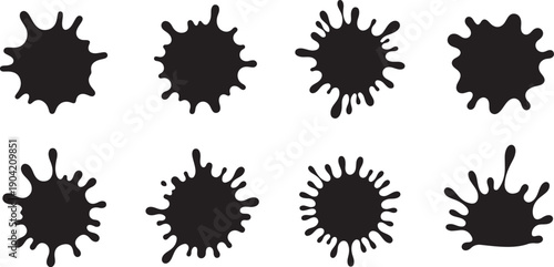 Eight black paint splatters on white background