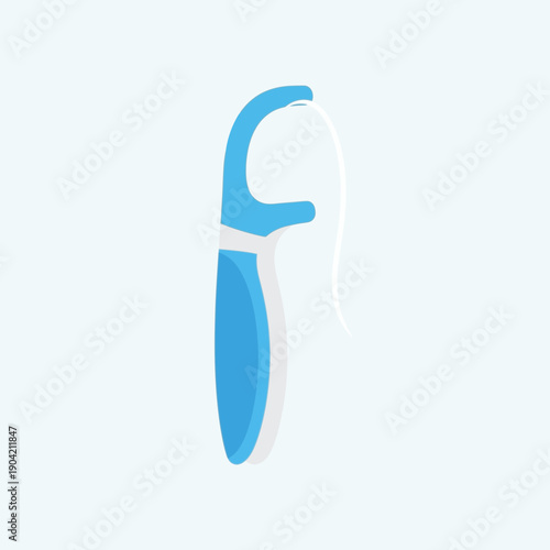 Blue dental floss pick isolated on light blue background, close-up