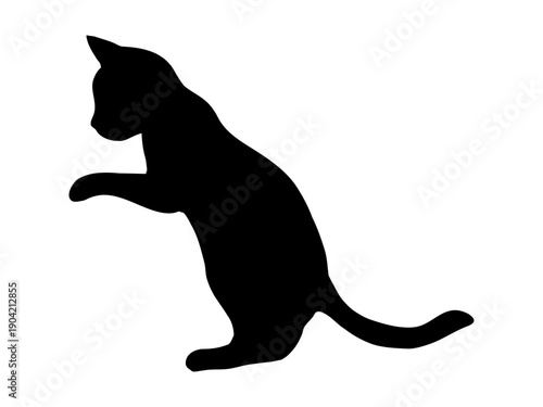 ネコのシルエット　立ち上がって興味を示す愛らしい仕草　イラスト