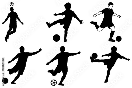 Soccer player silhouettes in action kicking a ball