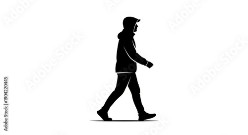 Silhouette of a man walking forward in a casual pose.