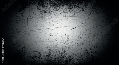 Dark grunge textured background with distressed scratches vignette lighting and dramatic worn surface