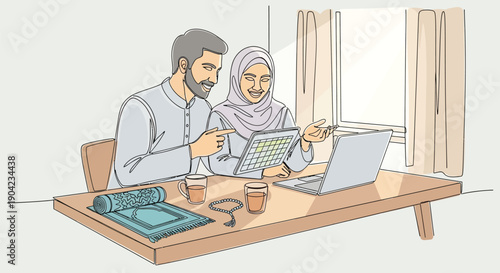 Happy Muslim couple planning activities together reviewing a digital calendar on a tablet next to a laptop and prayer items