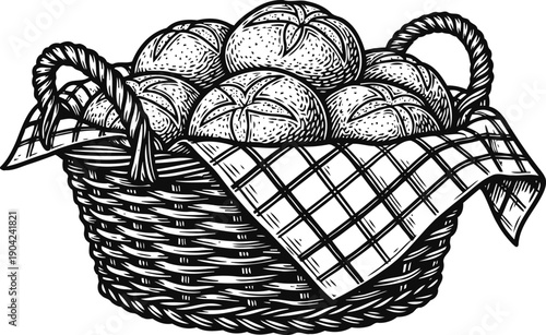 Basket woven basket filled with round loaves of bread on a checkered cloth napkin