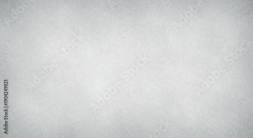 A softly textured, monochromatic gray background with subtle grain and variation.