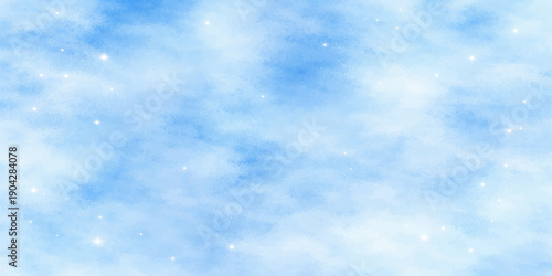 A beautiful clear blue sky with fluffy white cumulus clouds over natural snow creates a bright summer day atmosphere in this heavenly weather cloudscape