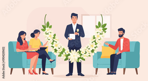 A man in a suit stands with a floral garland while two women and a man sit on sofas