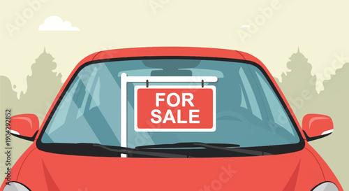 A red car with a "For Sale" sign displayed on its windshield