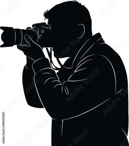 Silhouette of a man taking a photo with a camera