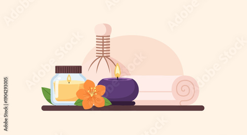 A spa set featuring a candle, oil, flower, and rolled towel