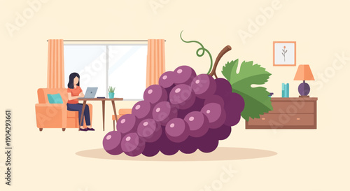 A woman works on a laptop in a living room with a giant bunch of grapes