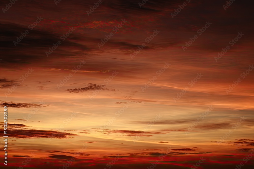 Obraz premium Dramatic sunset sky with varied clouds