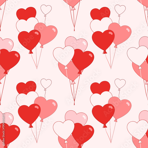 heart shaped balloons in pink and red.