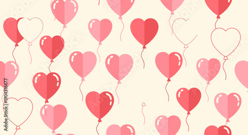 Heart shaped balloons on cream background.