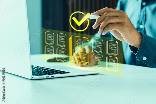 Businessman using a pen to approve digital documents on a virtual interface. Concept of paperless workflow, compliance, successful audit, and electronic signature
