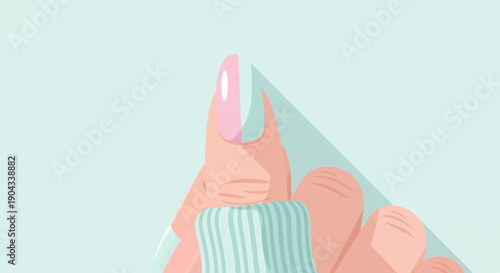 Close-up on manicured hand with pastel colored nails and a striped accessory