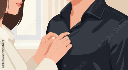 Close up of a woman buttoning a man's dark shirt indoors