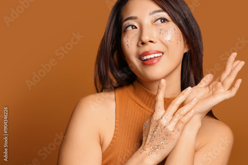 Beautiful young happy Asian...
