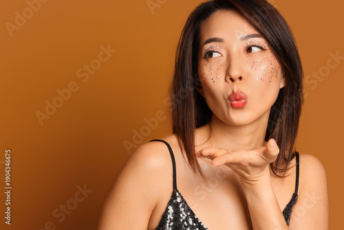 Beautiful young happy Asian...