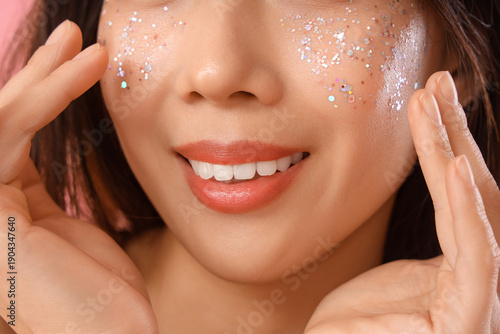 Beautiful young happy Asian...