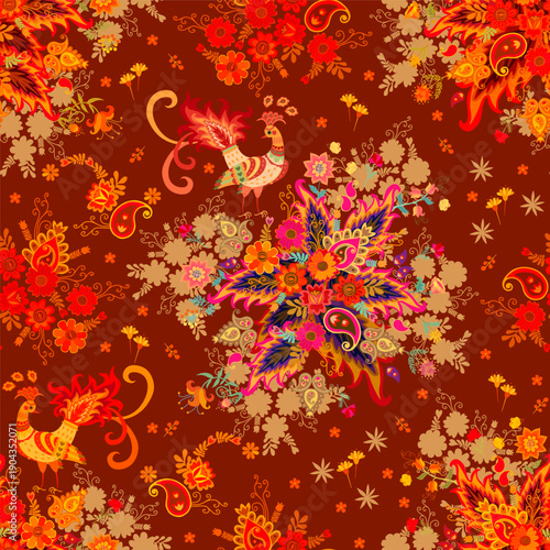 Fabulous seamless pattern featuring magical birds, lush flower bouquets, and paisley in warm autumn colors on a brown background. Beautiful folk fabric print.