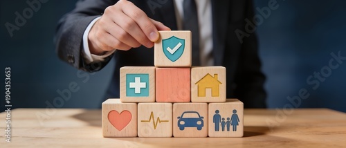 Building Comprehensive Benefits: Stacked Wooden Blocks Represent Insurance, Home, Health, and Auto