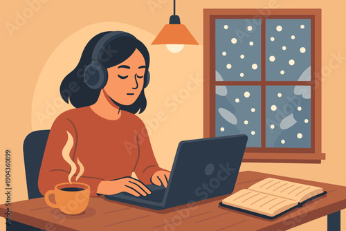 Woman works on laptop while drinking coffee and looking out at snowfall through window during winter