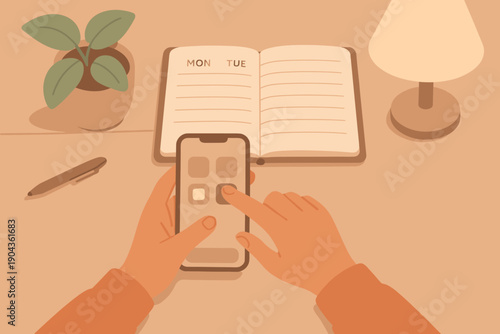 Person using a smartphone while sitting at a desk with a notebook and a lamp in a simple workspace setting