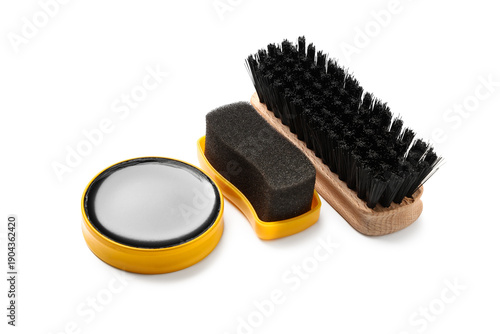 Shoe polish with brushes on...