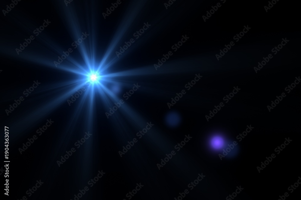 Fototapeta premium Blue optical lens flare light effect with starburst on black background.