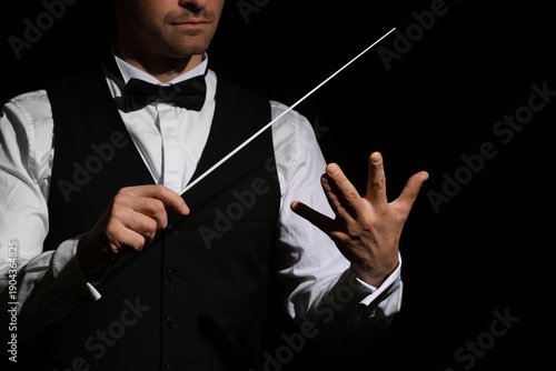Young male conductor with b...