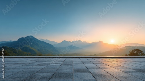 Sunrise landscape with a spacious square floor and mountain backdrop blank space for placing an image. Copy space image. Place for adding text and design.
