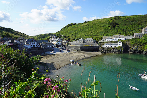 A harbour view of the small fishing village of Port Isaac on the Atlantic coast of north Cornwall, England, on a summer day.