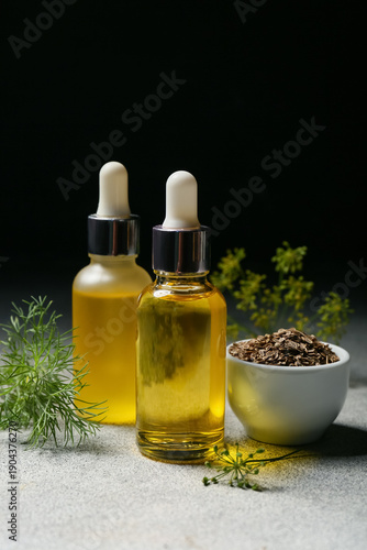 Bottles of dill seed essent...