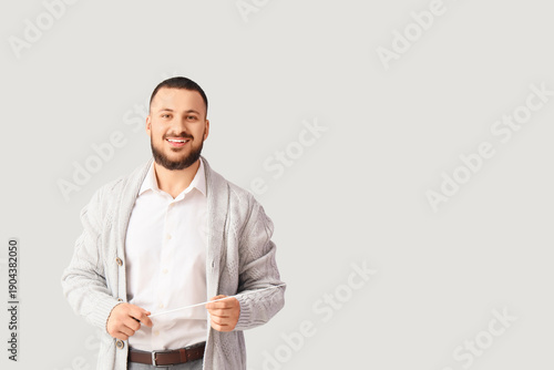 Male teacher with pointer o...