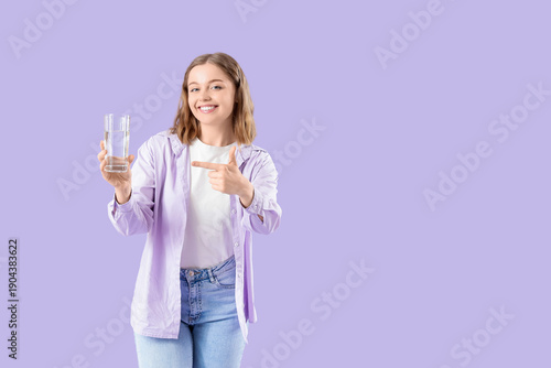 Young woman with glass of w...