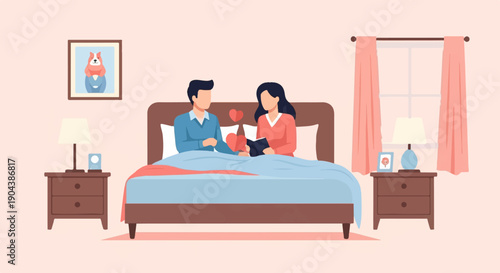 Couple in bed reading and sharing a heart