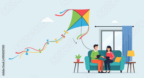 Couple indoors planning a kite activity with a colorful kite decoration