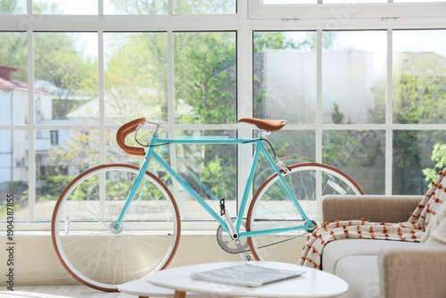 Bicycle near window in livi...
