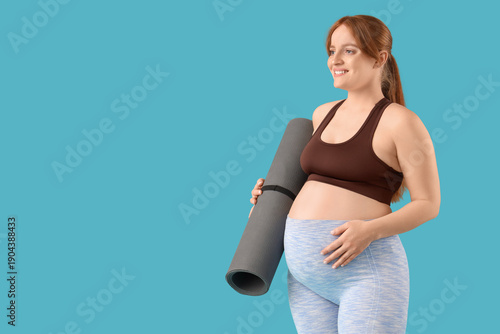 Sporty young pregnant woman...