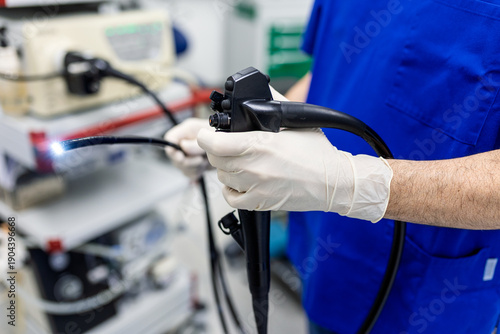 Tableau sur toile Surgeon holding endoscope for gastroscopy procedure