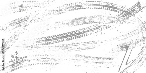 A chaotic arrangement of gray tire tracks and tread marks on a white background creating a distressed texture pattern.