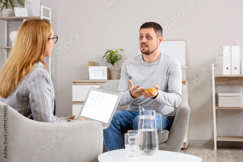 Male drug addict with pills...