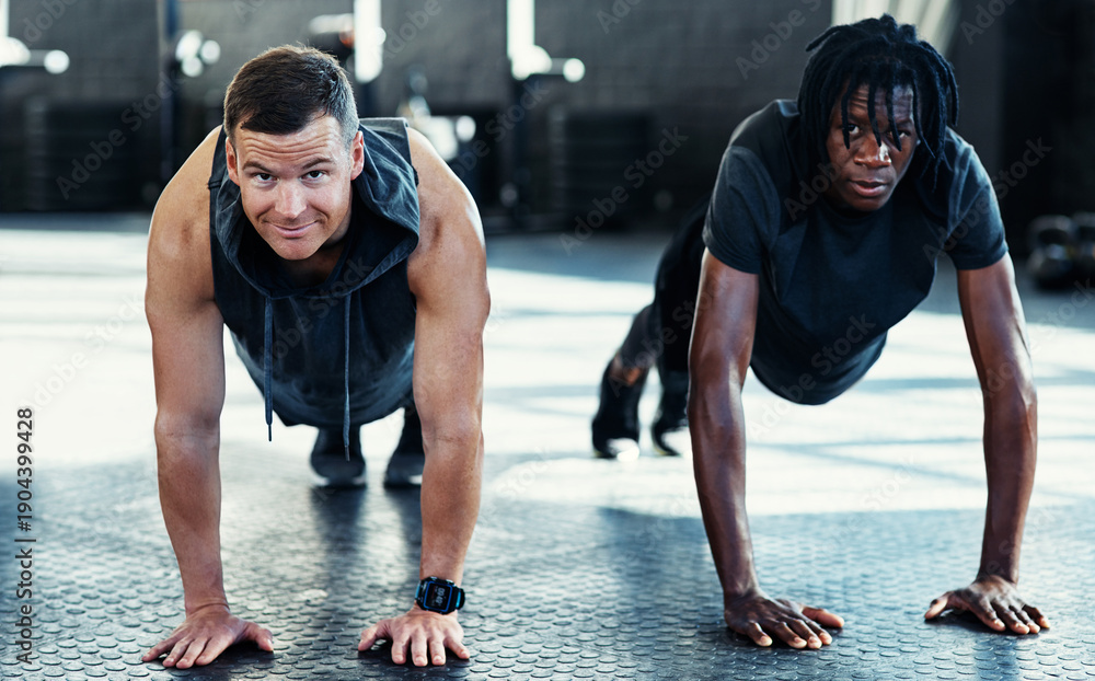 Naklejka premium Push up, fitness and friends in gym for exercise, wellness or challenge with active bodybuilding. Strong, health and men with arm workout for muscle, chest or bicep training in sports center.
